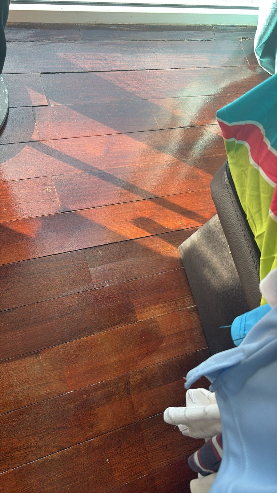 A parquet floor with light surface scratches and colour wear from everyday use